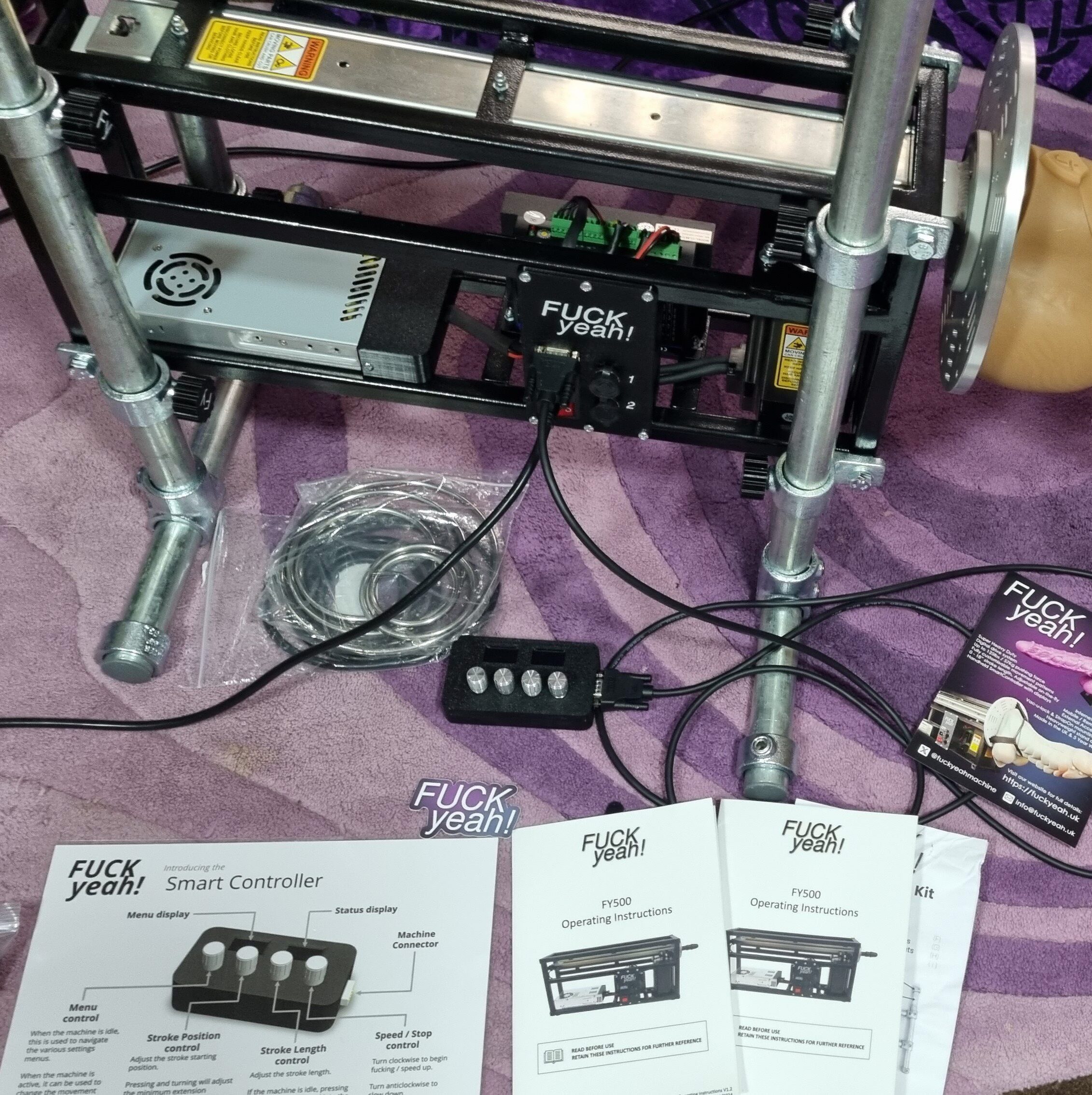 The Fuck yeah Machine with accessories and a giant dildo ready to play
